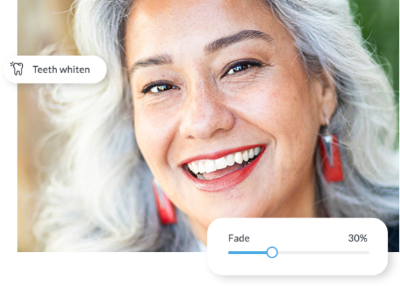 Woman with white-toothed smile and fade options in PicMonkey. Grey haired woman with red lipstick, brown eyes, and red earrings.